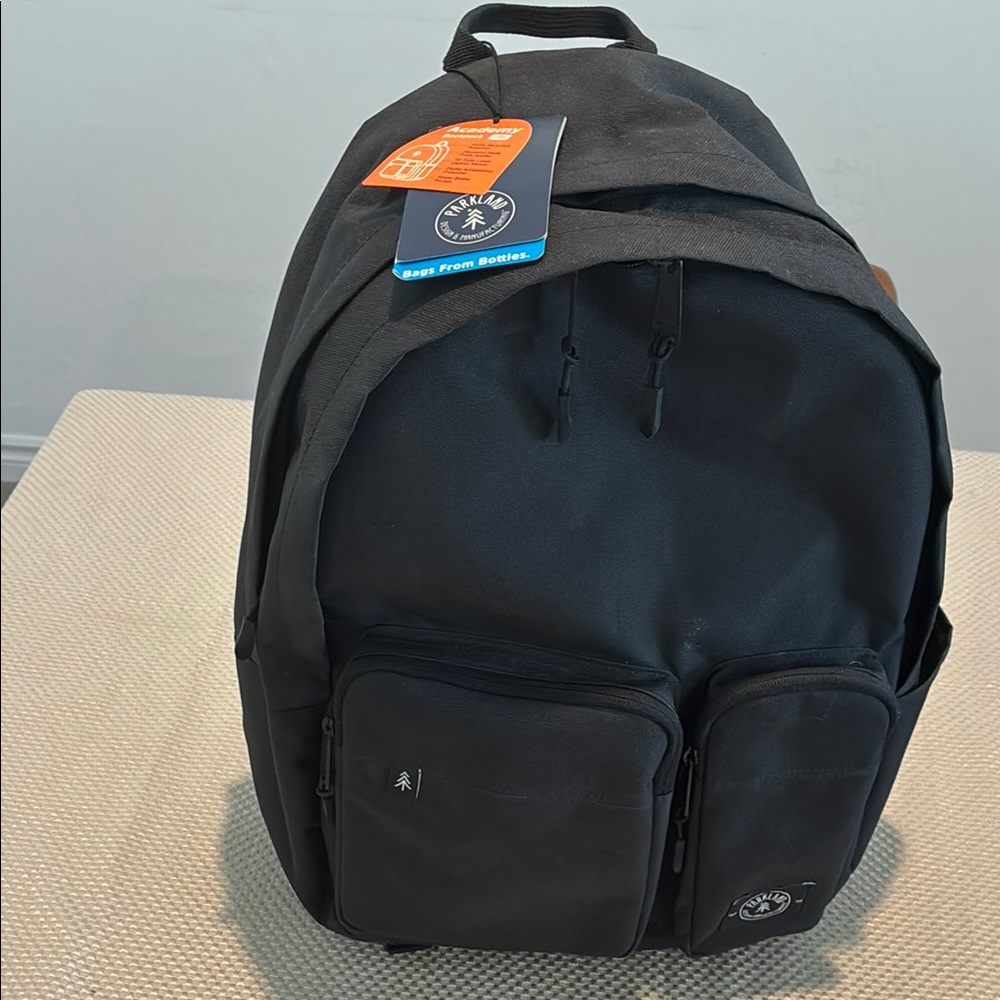 Classic Black Backpack with Durable Fabric and Minimalist Design